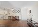 Open concept living room and kitchen with dining area featuring stylish furnishings and decor at 4141 N 31St St # 405, Phoenix, AZ 85016
