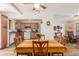 Bright dining room featuring hardwood floors and natural light open to kitchen and living area at 4225 N 16Th Ave, Phoenix, AZ 85015