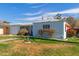 Charming single-story home with a well-maintained lawn, blue painted exterior, and lovely curb appeal at 4225 N 16Th Ave, Phoenix, AZ 85015