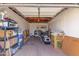 Spacious garage providing ample storage space and potential for various uses, full of boxes, shelves, and a bicycle at 4225 N 16Th Ave, Phoenix, AZ 85015