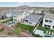 An aerial view of the property shows the manicured lawn, covered patio, and overall neighborhood landscape at 4370 E Kaibab Pl, Chandler, AZ 85249