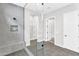 Modern tiled walk-in shower featuring glass surround and shower bench seating at 4370 E Kaibab Pl, Chandler, AZ 85249