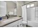 Bathroom with a single sink vanity and a shower with a bathtub at 4370 E Kaibab Pl, Chandler, AZ 85249