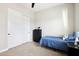 Bedroom featuring neutral walls, carpet, ceiling fan, window with shutters, and closet with sliding doors at 4370 E Kaibab Pl, Chandler, AZ 85249