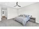 Bedroom with ceiling fan, neutral walls, and light carpet featuring a cozy bed setup at 4370 E Kaibab Pl, Chandler, AZ 85249