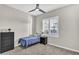 Cozy bedroom with a bed, bedside table, chest of drawers and window with shutter at 4370 E Kaibab Pl, Chandler, AZ 85249