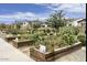 Close up of beautiful community garden with plots ready for planting, set in a meticulously maintained community at 4370 E Kaibab Pl, Chandler, AZ 85249