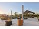 Inviting community space featuring covered seating, planters, and ambient string lights perfect for gathering at 4370 E Kaibab Pl, Chandler, AZ 85249