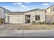 Charming single-story home with a stucco exterior, a two-car garage, and manicured landscaping enhancing curb appeal at 4370 E Kaibab Pl, Chandler, AZ 85249