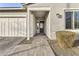 Close up of charming front door with well-manicured front yard, and a paved walkway at 4370 E Kaibab Pl, Chandler, AZ 85249