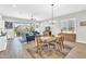 Open living room with modern decor, comfortable seating, lots of natural light and access to the backyard at 4370 E Kaibab Pl, Chandler, AZ 85249