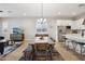 Inviting living space with dining table, open to living area, and modern kitchen features at 4370 E Kaibab Pl, Chandler, AZ 85249