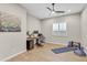 Spacious office or flex room with ceiling fan, hardwood floors, and neutral paint at 4370 E Kaibab Pl, Chandler, AZ 85249
