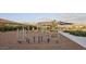 Community playground equipment offers various activities for , encouraging active play and socialization at 4370 E Kaibab Pl, Chandler, AZ 85249