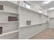 Spacious walk-in closet featuring built-in shelving and ample storage space at 4370 E Kaibab Pl, Chandler, AZ 85249