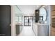 Bright bathroom featuring double marble vanity, modern sinks, and a frameless glass shower at 4434 E Camelback Rd # 128, Phoenix, AZ 85018