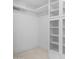 Spacious walk-in closet with built-in shelving and ample storage space at 4434 E Camelback Rd # 128, Phoenix, AZ 85018