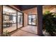Exterior shot of a tile entry, with a peak into the dining and living spaces at 4434 E Camelback Rd # 128, Phoenix, AZ 85018
