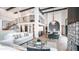 Bright, modern living room with soaring ceilings, black beams, and comfortable white sofas at 4434 E Camelback Rd # 128, Phoenix, AZ 85018