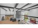 Overlook with views of modern living space featuring beams, fireplace, and bright windows at 4434 E Camelback Rd # 128, Phoenix, AZ 85018
