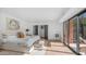 Bright and airy main bedroom with natural light, access to private outdoor patio, and modern decor at 4434 E Camelback Rd # 128, Phoenix, AZ 85018