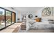 Bright and airy main bedroom with natural light, access to private outdoor patio, and modern decor at 4434 E Camelback Rd # 128, Phoenix, AZ 85018