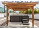 Backyard features covered hot tub, modern pergola and gravel landscape at 4721 N 24Th St, Phoenix, AZ 85016