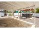 Backyard features covered patio with a modern hot tub at 4721 N 24Th St, Phoenix, AZ 85016