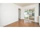 Living space features concrete floors, white walls, view of backyard, and flows into kitchen and dining at 4721 N 24Th St, Phoenix, AZ 85016