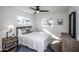 Serene bedroom featuring neutral tones, comfortable bedding, and lots of natural light from the windows at 4729 N 24Th St, Phoenix, AZ 85016