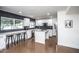 Bright and open kitchen featuring modern white cabinets and stainless steel appliances at 4729 N 24Th St, Phoenix, AZ 85016