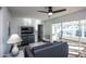 Bright living room with gray sofa and a large window with abundant natural light at 4729 N 24Th St, Phoenix, AZ 85016