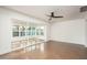 Spacious living area featuring a ceiling fan and access to a bright sunroom at 4729 N 24Th St, Phoenix, AZ 85016