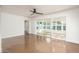 Open living area with sliding glass doors leading to a sunroom at 4729 N 24Th St, Phoenix, AZ 85016