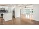 Open-concept living space with modern kitchen, stainless steel appliances, and abundant natural light at 4729 N 24Th St, Phoenix, AZ 85016