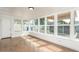 Bright sun room boasts multiple windows offering scenic backyard views and ample natural light at 4729 N 24Th St, Phoenix, AZ 85016