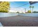 Large backyard with gravel landscaping, and a block fence at 4735 N 24Th St, Phoenix, AZ 85016