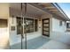 Stylish front entrance with modern door, large window, and gray brick accents, creating curb appeal at 4735 N 24Th St, Phoenix, AZ 85016
