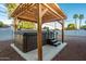 Covered hot tub with steps and pergola in backyard at 4735 N 24Th St, Phoenix, AZ 85016