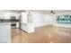 Open floor plan with a modern kitchen and a spacious living room with bright windows at 4735 N 24Th St, Phoenix, AZ 85016