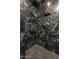 Modern shower featuring black marble tile and stylish fixtures at 4735 N 24Th St, Phoenix, AZ 85016