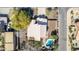 Aerial view of backyard pool, outdoor landscaping, and white tile roof at 4937 W Desert Hollow Dr, Phoenix, AZ 85083