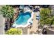 Aerial view of the pool, outdoor landscaping, and manicured grounds at 4937 W Desert Hollow Dr, Phoenix, AZ 85083