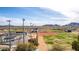 Aerial showcases baseball fields against a desert backdrop, offering recreational opportunities for the community at 4937 W Desert Hollow Dr, Phoenix, AZ 85083