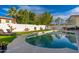 Inviting backyard pool area with lush landscaping, lounge chairs, and a serene atmosphere at 5010 E Nisbet Rd, Scottsdale, AZ 85254