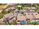 A neighborhood aerial view with well-maintained homes, landscaping, cul-de-sac, community tennis and pool at 5225 S Opal Pl, Chandler, AZ 85249