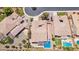 An aerial view of a property showcasing the backyard pool, patio, and well-manicured landscaping at 5225 S Opal Pl, Chandler, AZ 85249