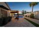 Paver patio and pergola create inviting outdoor space leading to private pool and landscaped surroundings at 5225 S Opal Pl, Chandler, AZ 85249