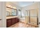 Bright bathroom featuring a tub, a separate shower, double vanity sinks with lots of counter space at 5225 S Opal Pl, Chandler, AZ 85249