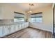 Bright dining area features ample natural light and custom cabinetry, perfect for casual meals or entertaining at 5225 S Opal Pl, Chandler, AZ 85249